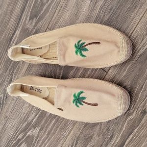 Soludos tan espadrilles with green palm tree embroidered on top